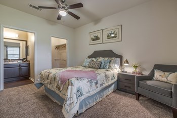 Apartments in Spring TX - Edgewater at Klein - Spacious Bedroom with Plush Carpeting, Private Bathroom and Large Closet - Photo Gallery 15