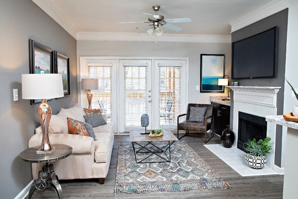 a living room with a couch and a tv