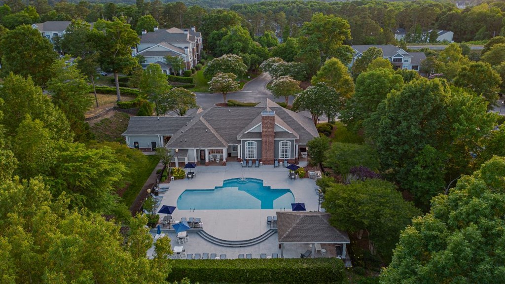 an aerial view of the pool at the estate