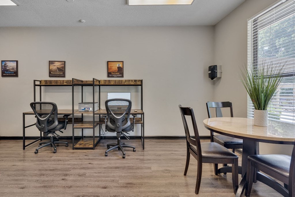 our office is equipped with a round table and chairs