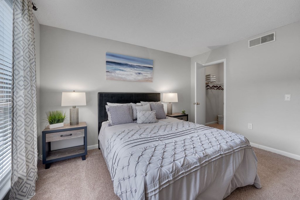 our apartments offer a spacious bedroom with a large bed