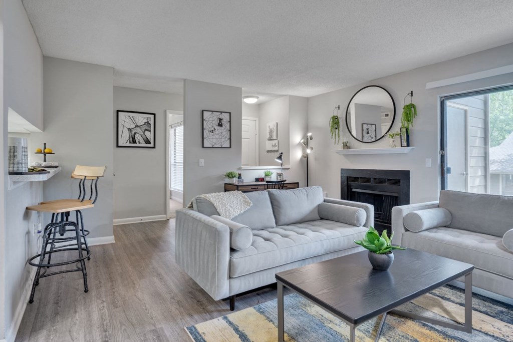 a living room with couches and a coffee table