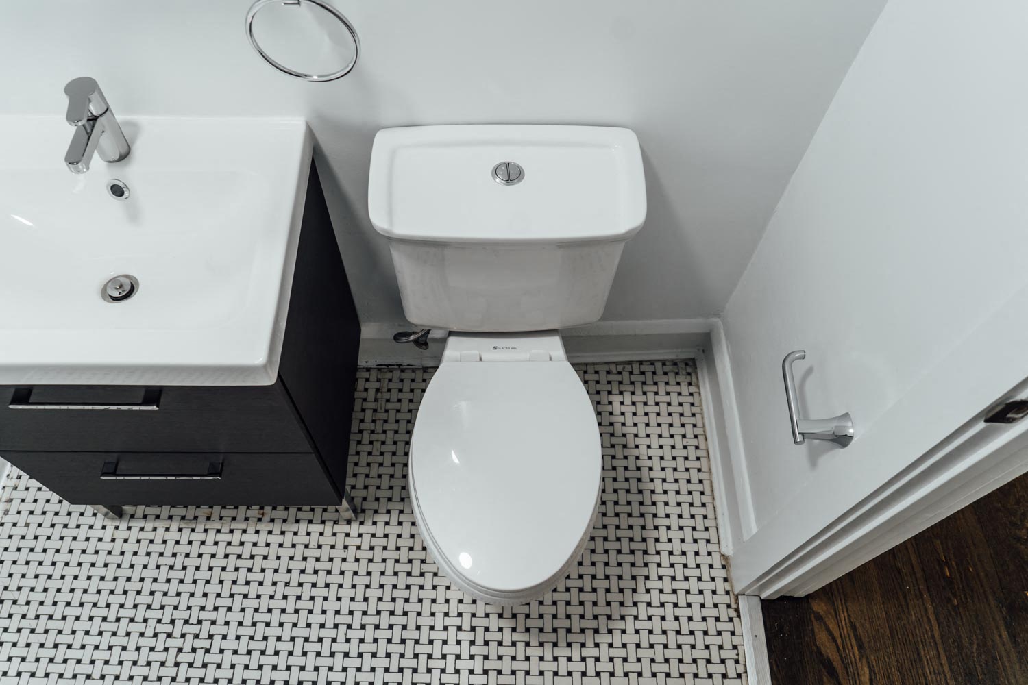 a bathroom with a toilet and a sink