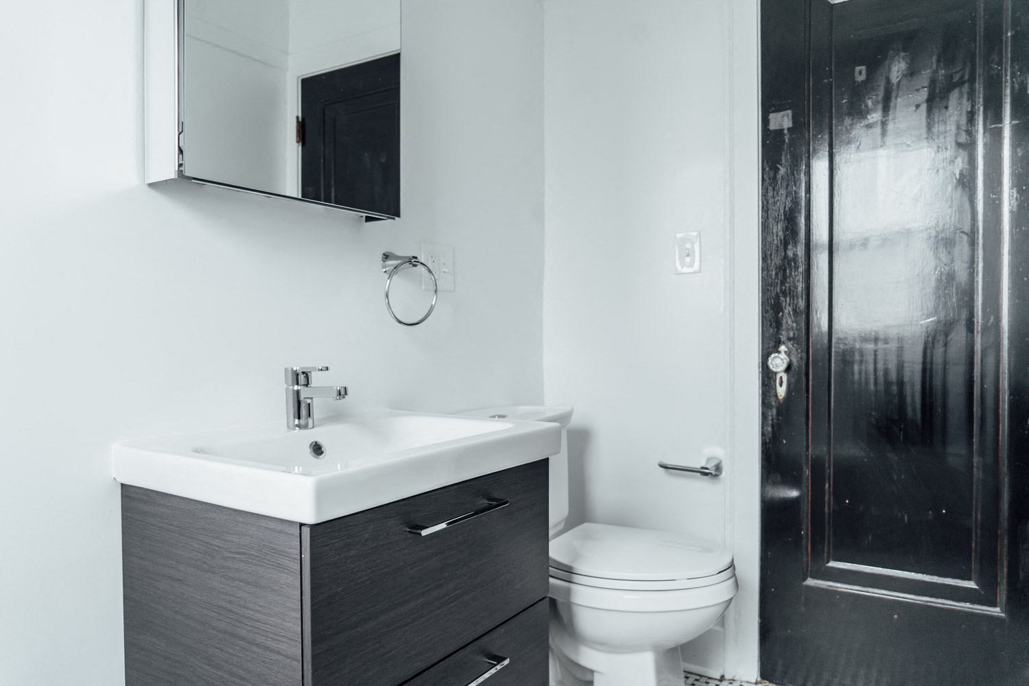 a bathroom with a sink toilet and a shower