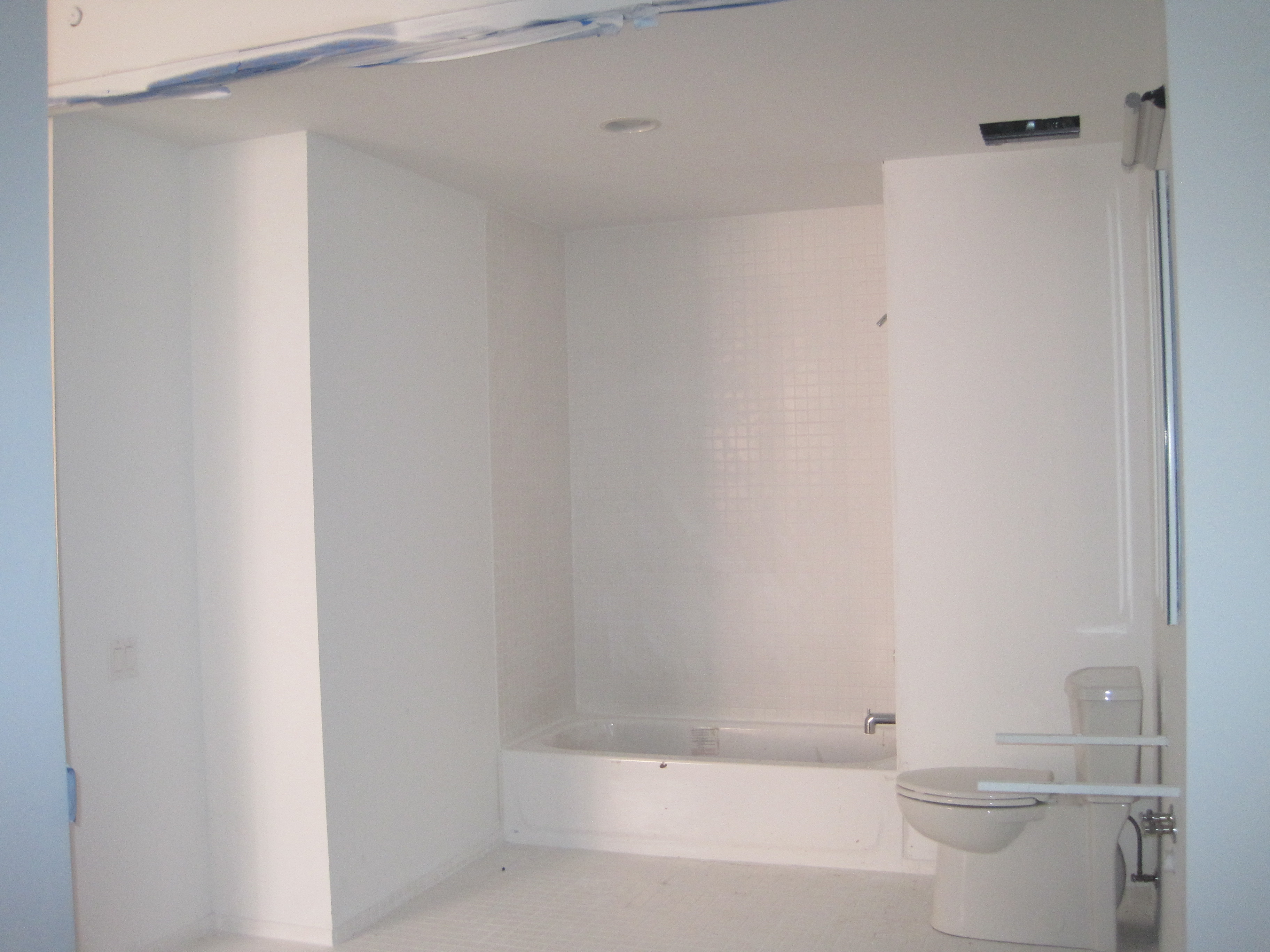 the bathroom is primed and ready to be painted