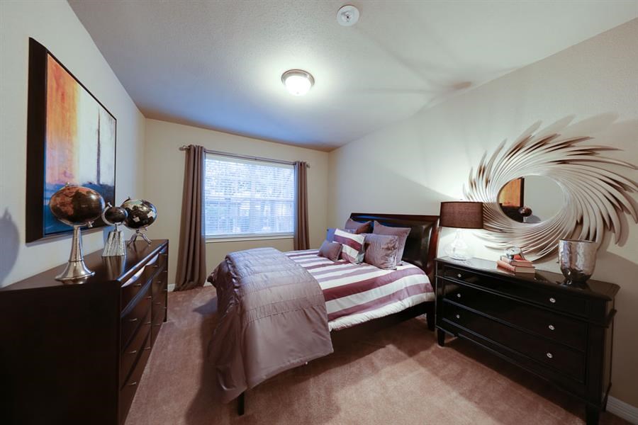 bedroom 1 with natural light at River Pointe, Conroe, TX