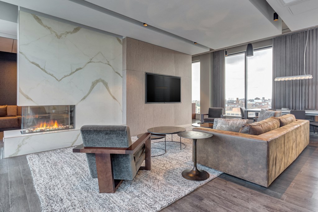 a living room with a fireplace and a couch