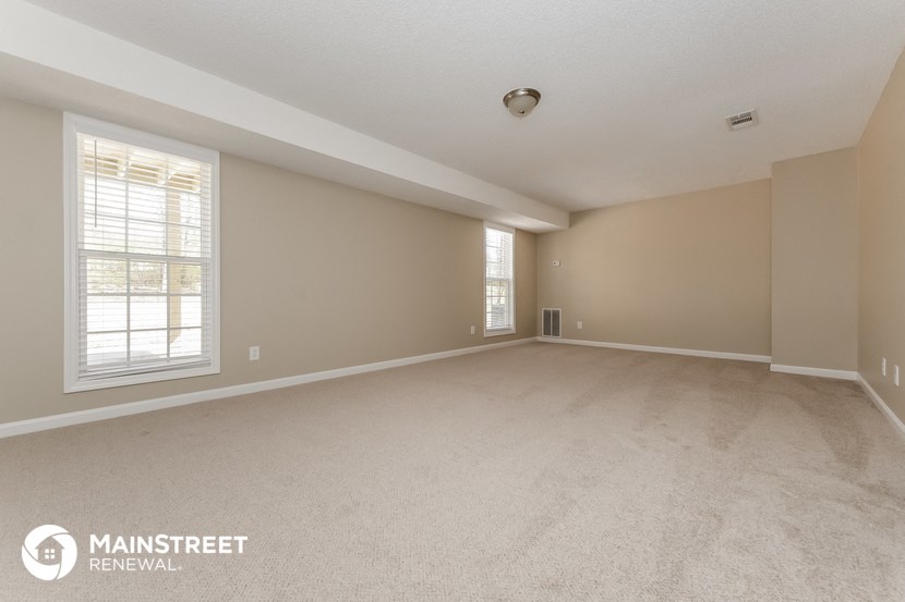 the spacious living room and dining room are empty and ready for you to use
