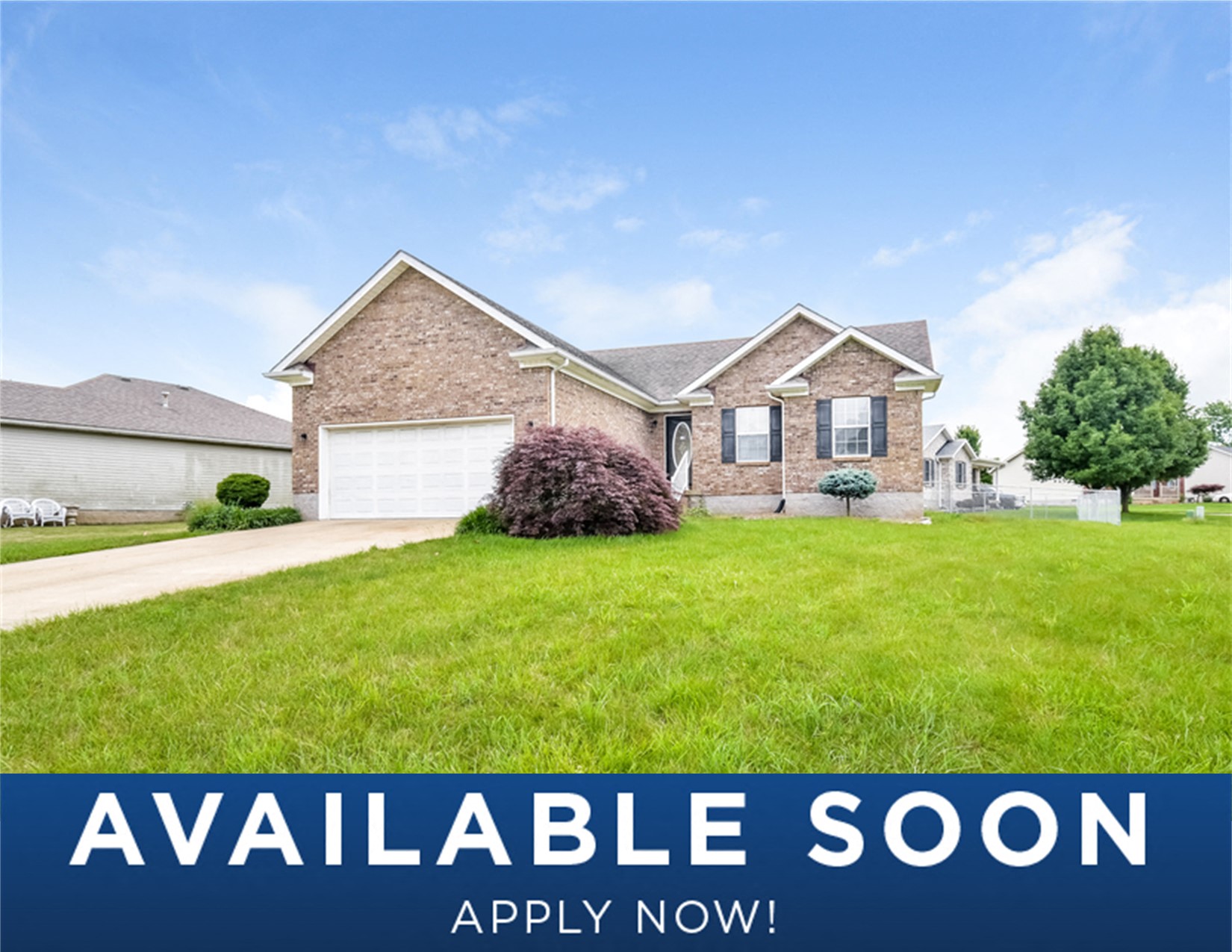 a house with a lawn in front of it