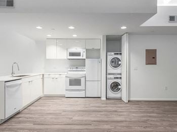 Kitchen and Washer and Dryer at Market District Lofts, Cleveland
