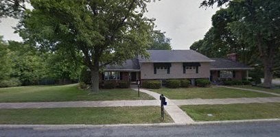 a house on the side of a street