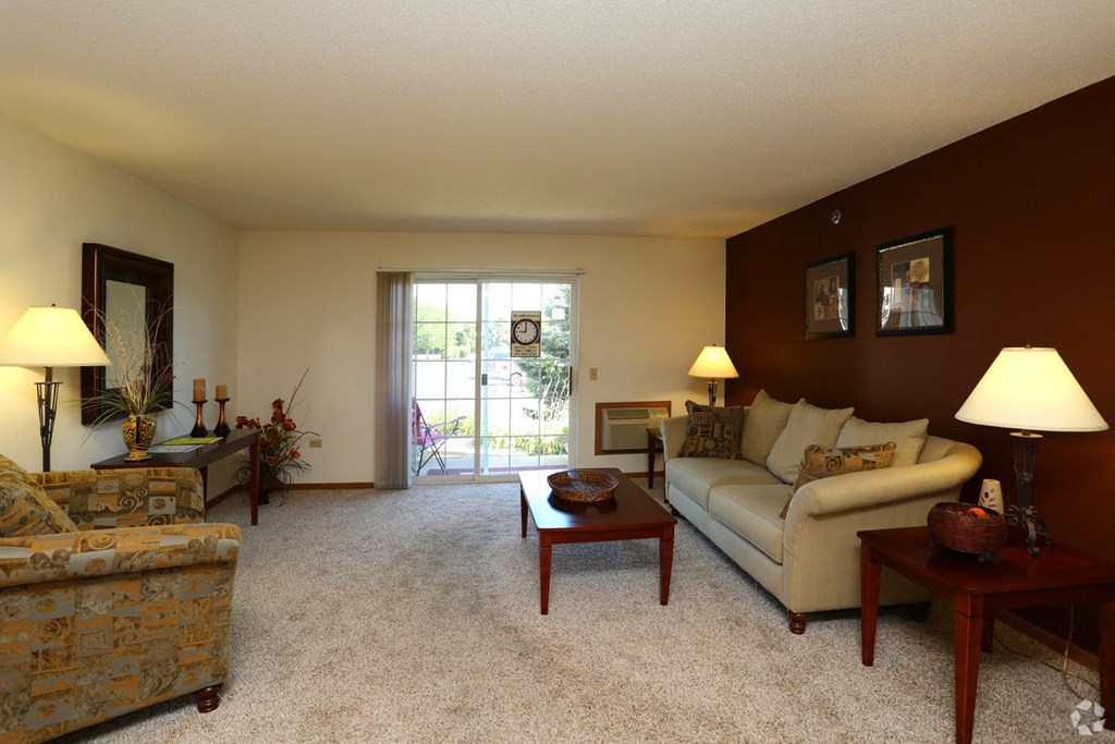 a living room with a couch and a table
