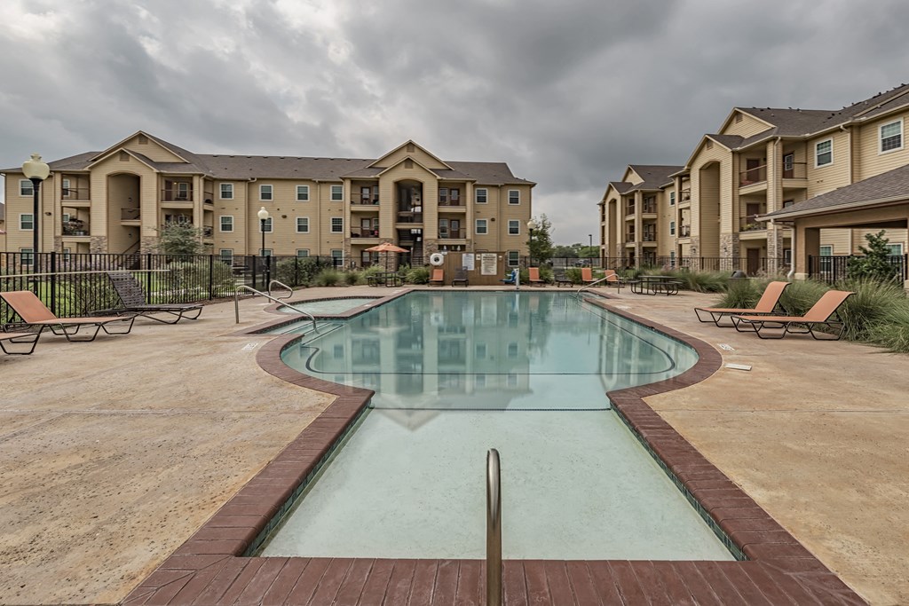 our apartments have a resort style pool with lounge chairs