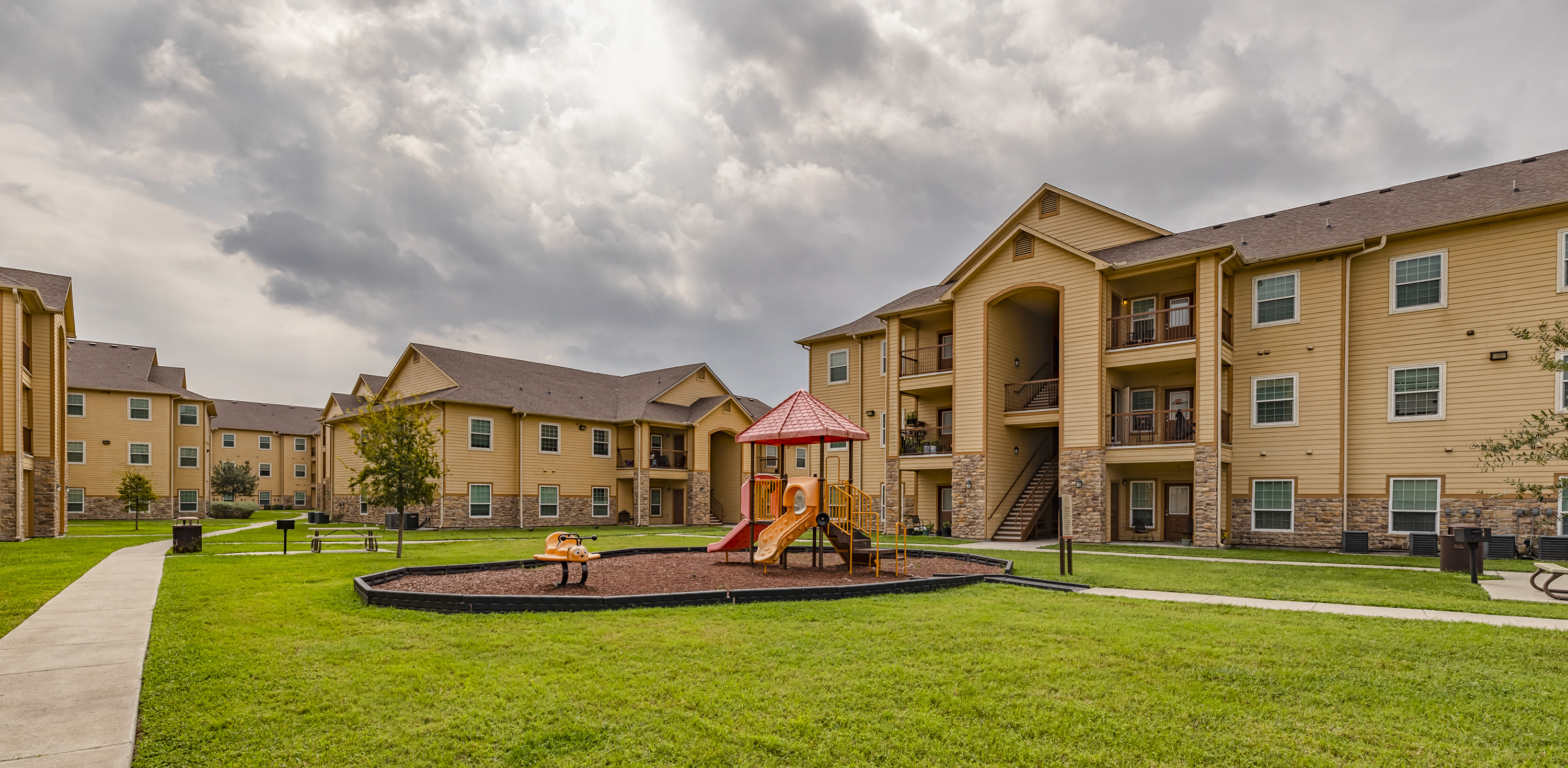 our apartments have a spacious playground and a green lawn