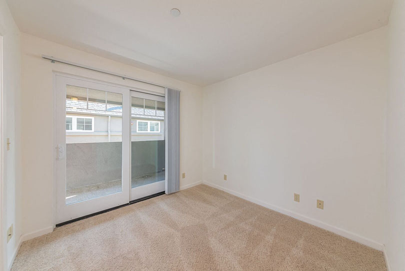 Bedroom with window  l 132 Clay Street Apartments