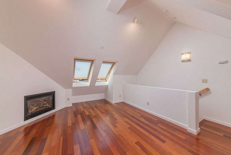 Living are with fireplace and window  l 132 Clay Street Apartments