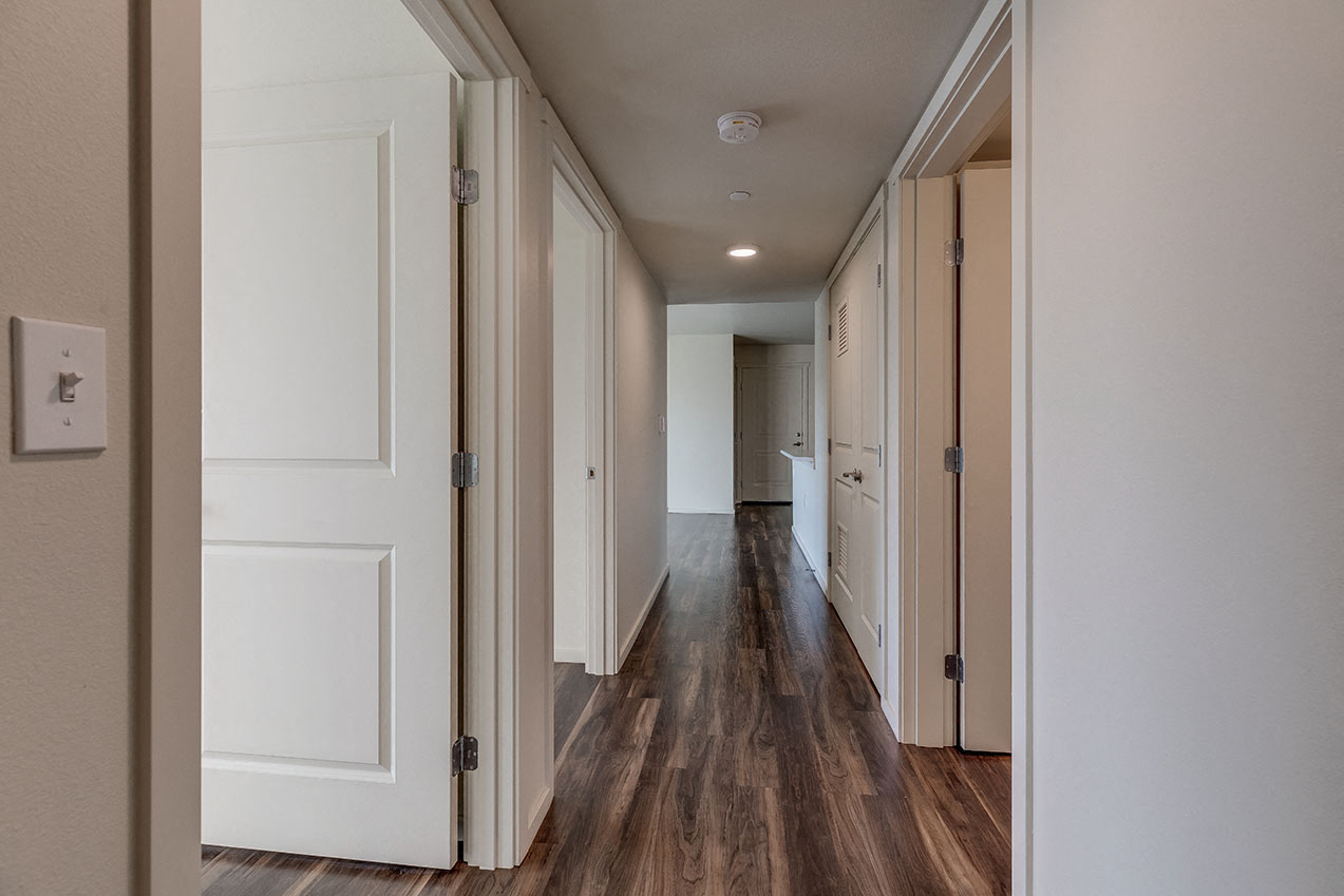 Hallway through apt l Gateway by Vintage