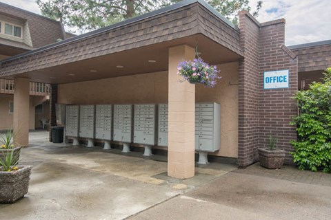 a building with a bunch of urinals and a sign on the side of it