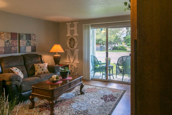 a living room with a couch and a table