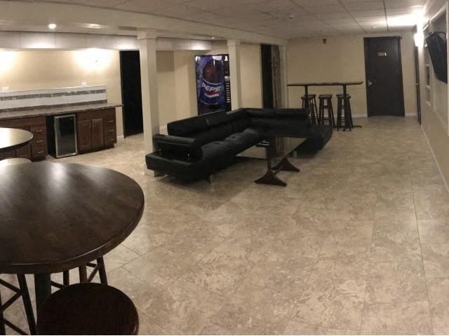 a living room with a couch and a table