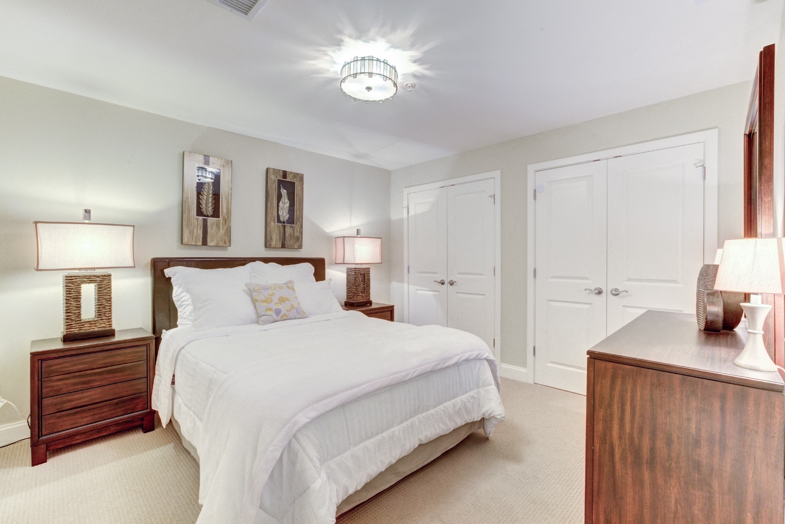 a bedroom with a bed and a closet