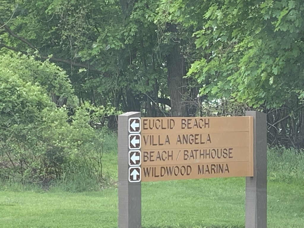 the sign for the beach villa angela beach