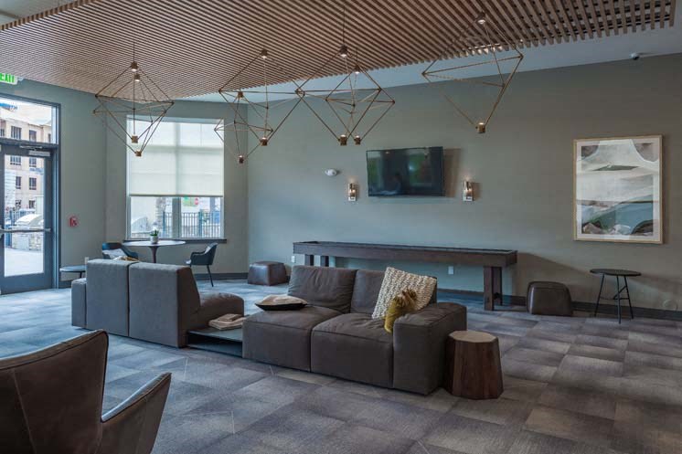 a living room with a couch and a table