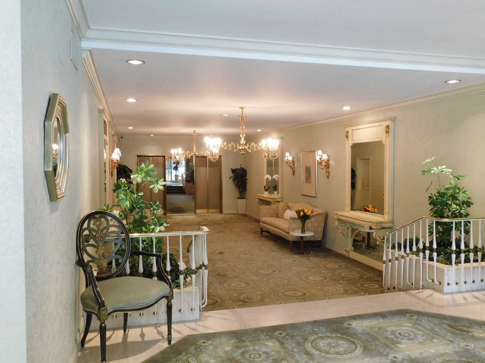 a view of a living room with a baby crib