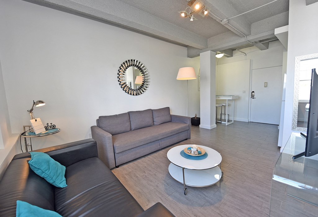 a living room with a couch and a coffee table