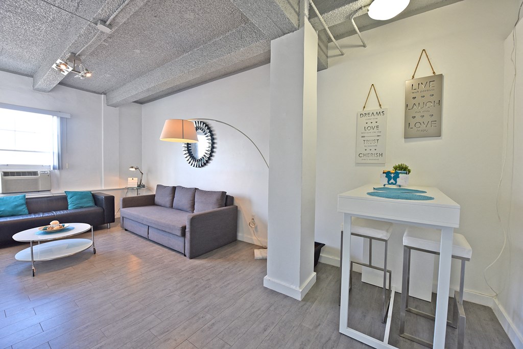 a living room with a couch and a table