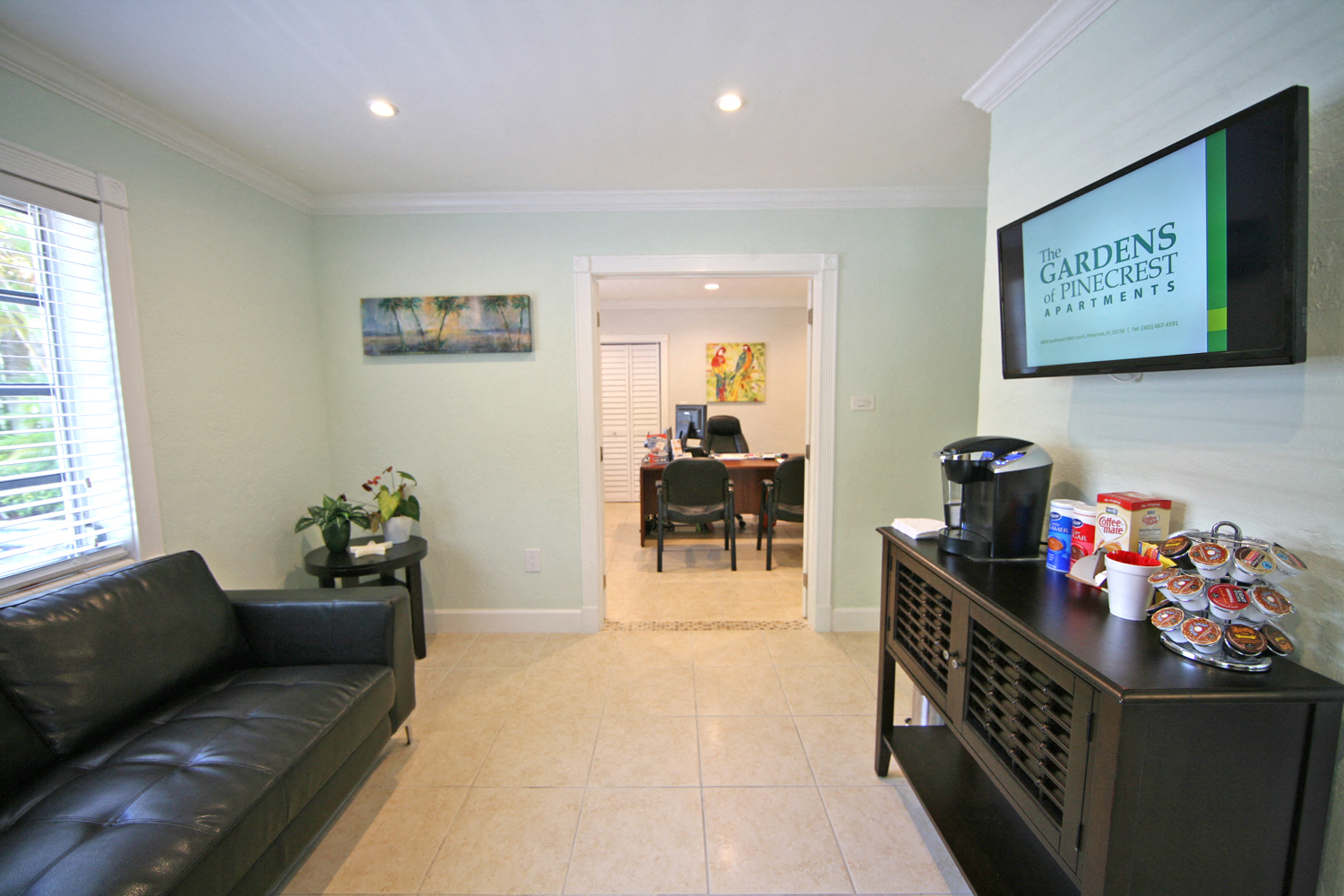 a living room with a couch and a tv