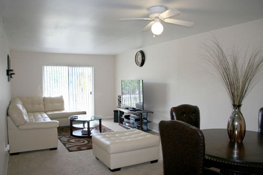 a living room with a couch and a table
