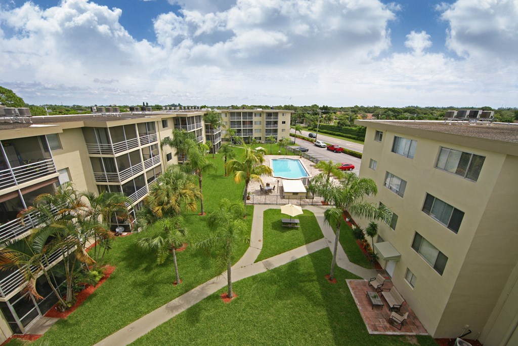 a view of the pool at the resort at longboat key club