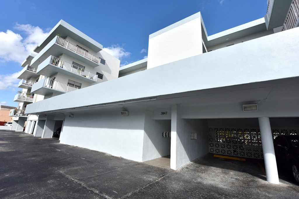 a white building with a blue sky behind it