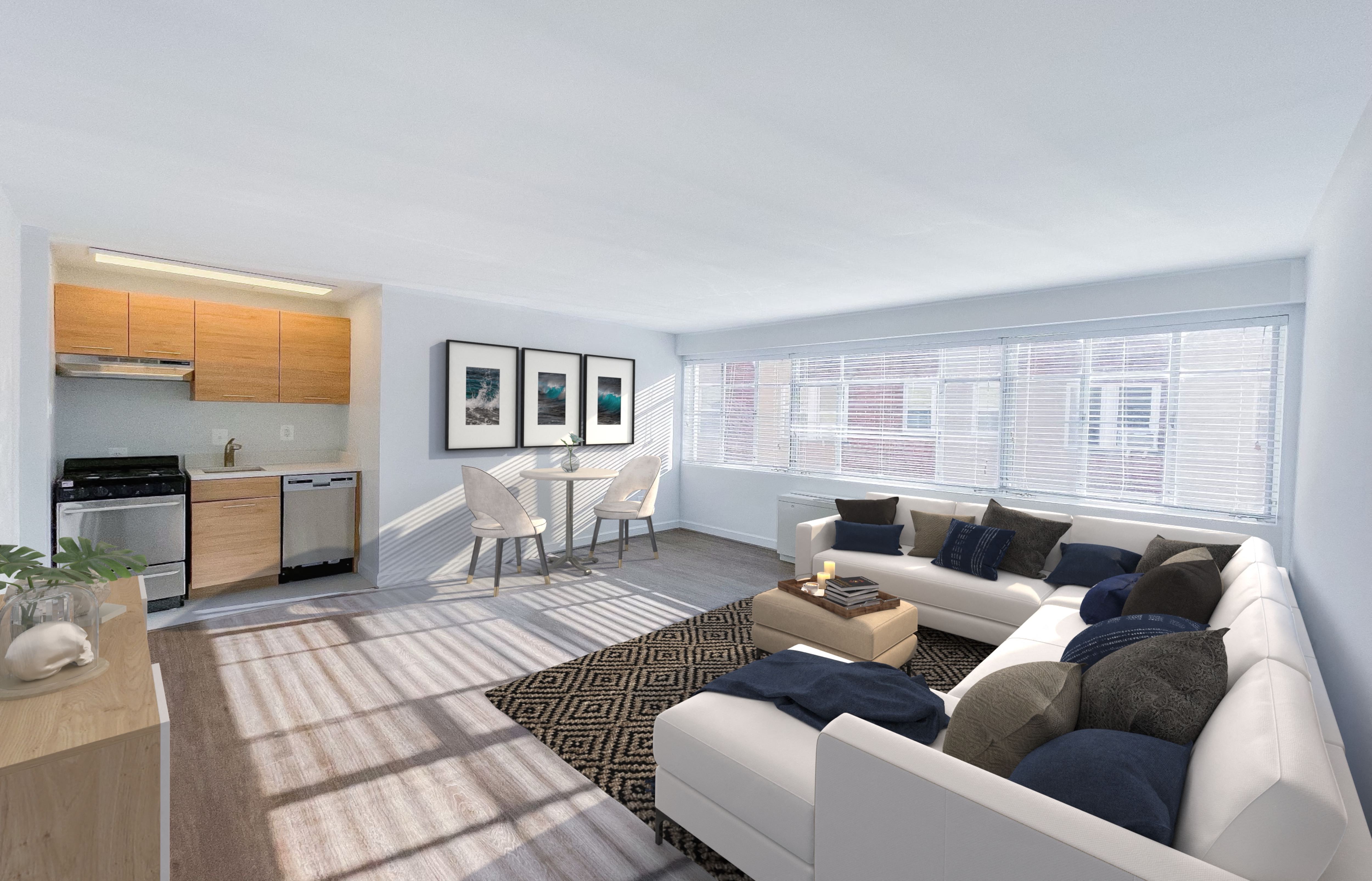 living space in a Gelmarc Towers apartment with a large sectional, small dining set, and storage