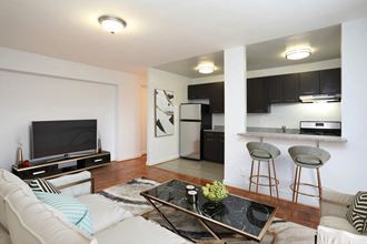 Living Room And Kitchen At Macomb Gardens Apartments In Washington D.C.