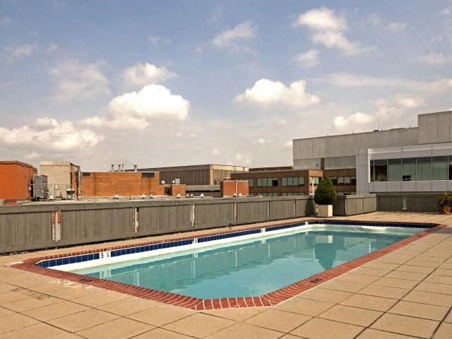 a swimming pool on the roof of a building