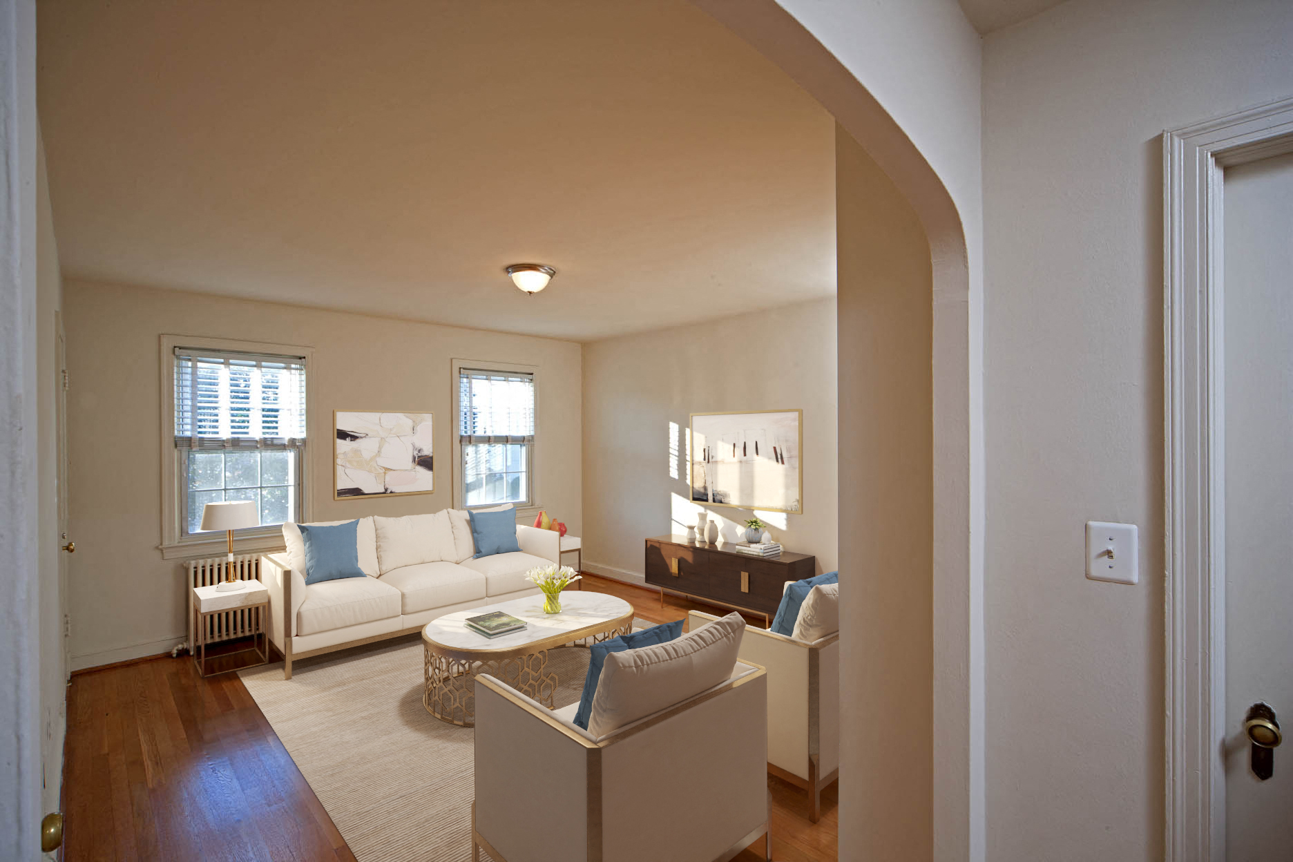 a living room with a couch and a table