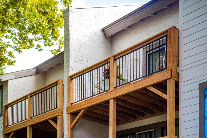 a house with a deck and a balcony