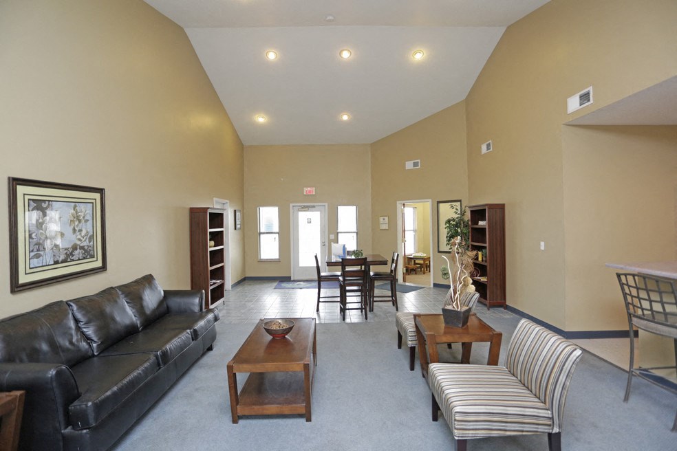 a living room with a couch and a table