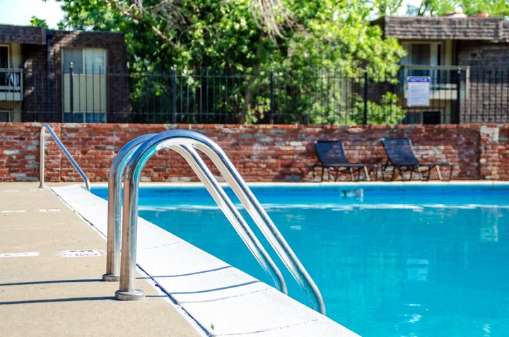 the swimming pool at our apartments is clean and ready to use