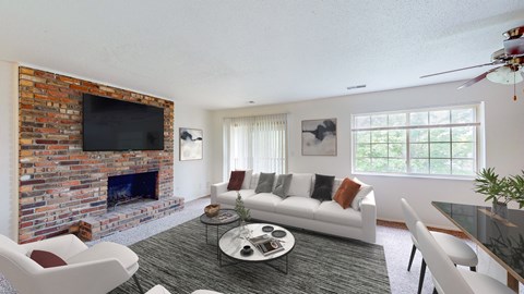 a living room with a couch and a fire place