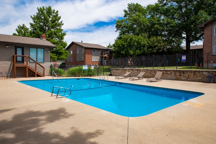 our apartments have a resort style pool with chairs