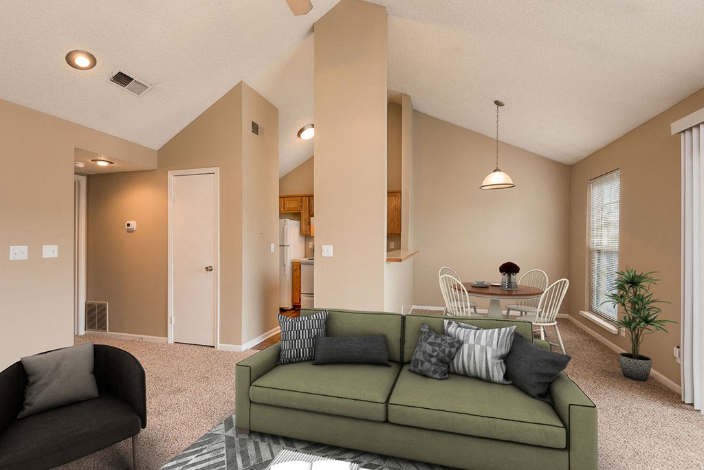 a living room with a couch and a table