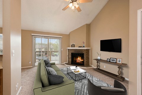 a living room with a fireplace and a couch