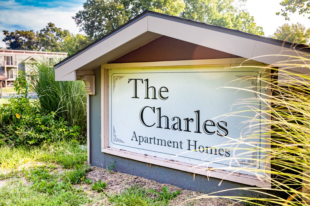 the apartment homes sign on the side of a building