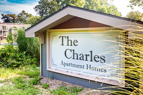 the apartment homes sign on the side of a building