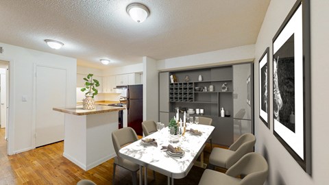 a dining room and kitchen with a table and chairs