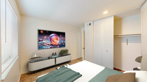 a bedroom with a large bed and a white closet