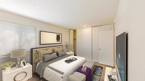 an image of a bedroom with a bed and a tv